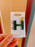 SHDL - Disney Character English Alphabet ‘H’ Happy Pin