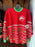 Universal Studios - Christmas 2025 - Jurassic Park Spirit Jersey “Jingle Roars” Red Pullover (Adult)