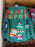 Universal Studios - Christmas 2025 - Minions Spirit Jersey “Holiday Happiness” Green Pullover (Adult)