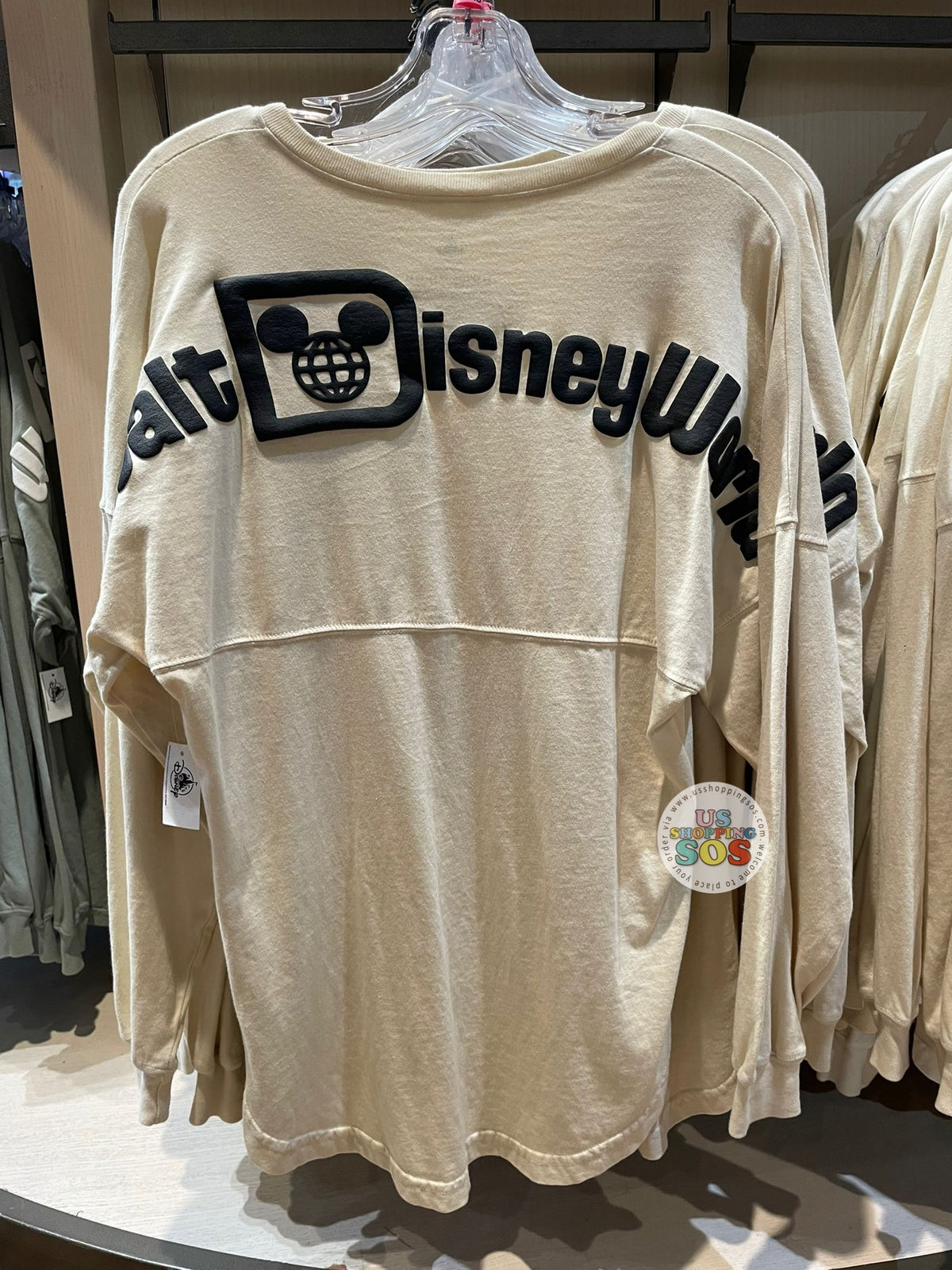 DLR/WDW - Spirit Jersey Black Logo & Words Cream V-Neck Pullover