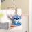 China Exclusive- Stitch ‘Flowers on the Head’ Plush Keychain (Sitting)