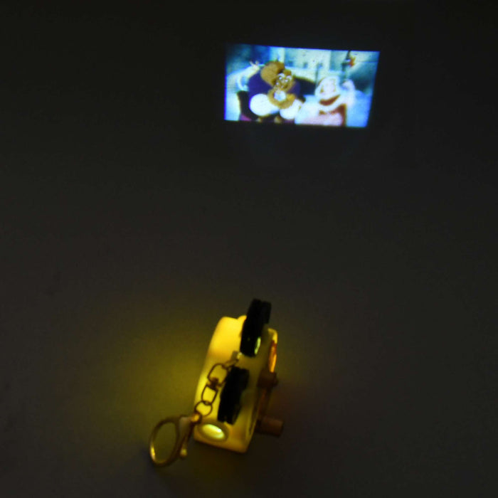 JDS - 2026 Key chain Fes x Beauty and the Beast Belle Light Up Projection Machine Keychain