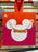 DLR/WDW - Logo Mania 2026 Park Hopper - Bright Orange Park Marquee Necklace