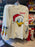 DLR/WDW - Christmas 2025 - Santa Donald & Friends Cream Long Sleeve Tee (Adult)