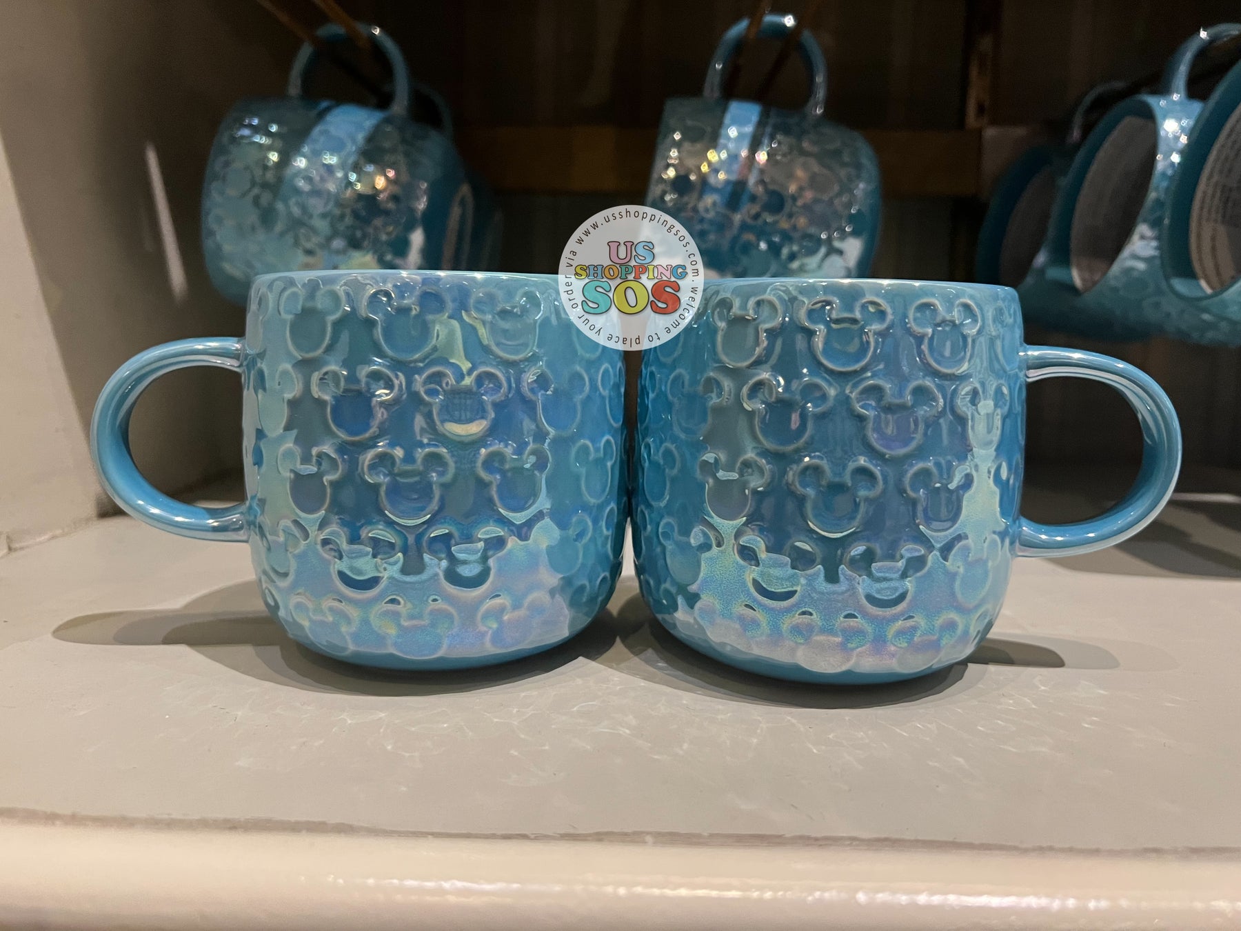 DLR/WDW - Mickey Embossed Icon Iridescent Sea Blue Mug