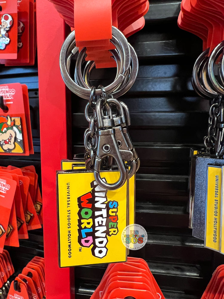 Universal Logo Keychain Universal Studios - Super Nintendo World - Logo Yellow Keychain ...