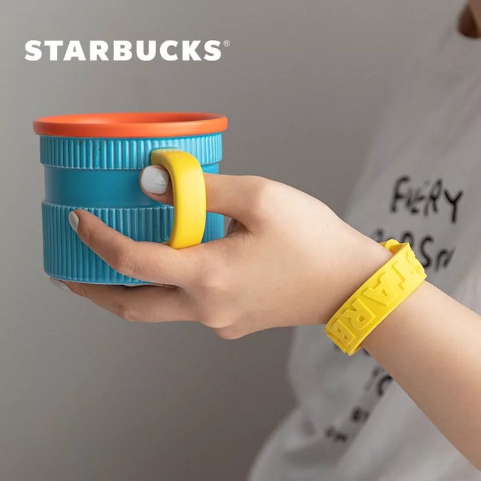 Starbucks China - Happy Camping - 3. Logo Wristband Stripe Embossed Mug Orange/Blue/Yellow 385ml